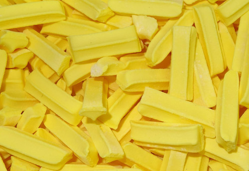 Premium Mini Fruit Sticks Bulk - Yellow with a Lemon Flavour, by Cooks Confectionery,  and more Confectionery at The Professors Online Lolly Shop. (Image Number :9893)