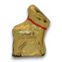 Single Lindt Mini Reindeer in festive gold foil wrapping with a red bow, available at The Professors Online Lolly Shop.