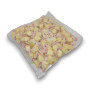 Angled view of creamy yellow Butter Taffy salt water taffy pieces in bulk packaging, available at The Professors Online Lolly Shop.