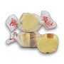 Close-up of Taffy Town French Toast Salt Water Taffy showing creamy yellow and brown swirled taffy pieces.