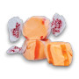 Close-up of Taffy Town Orange Salt Water Taffy with orange-striped chewy pieces in individual wrappers.