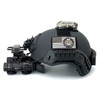 Side profile of a fully equipped black FAST Ballistic Helmet Level IIIA with mounted night vision goggles ear protection and strobe light