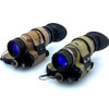 Angled front view of PVS-14 night vision monoculars protected by the Multicam 500D Cordura wrap by Reese Wraps