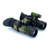 Angled front view of RNVG night vision binoculars protected by the Multicam 500D Cordura wrap by Reese Wraps