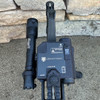 Top down view of the compact DIR-ONE infrared aiming laser integrated onto a tactical rifle rail next to a weapon light