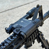 Top down view of the compact DIR-1G visible green laser integrated onto a rail system