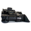 Side profile view of the USNV Banshee dual tube night vision goggle showing the rugged housing and objective lens