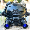 Direct front view of the ARNVG articulating dual tube night vision goggle mounted to a tactical helmet