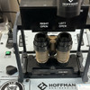 MH-1 dual tube night vision goggle mounted on a Hoffman Engineering ANV-126A test set for precise optical alignment and quality control