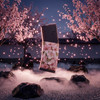 Stylized aesthetic display of the Cherry Blossom Mag Wraps AR-15 magazine vinyl wrap in an outdoor setting