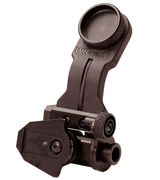 Angled top profile of the black Wilcox J-Arm dovetail adapter designed for secure PVS-14 night vision helmet mounting