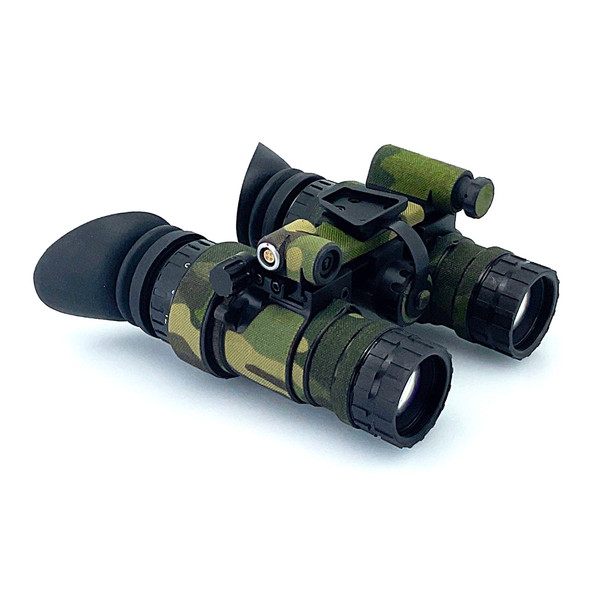 Angled front view of RNVG night vision binoculars protected by the Multicam 500D Cordura wrap by Reese Wraps