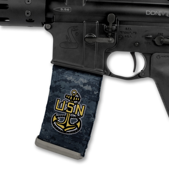 Side profile of an AR-15 lower receiver showing a tactical magazine customized with the black and white US Navy logo Mag Wraps decal skin