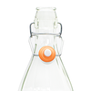 A 1 litre glass faceted swing stopper glass bottle