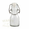 A small  swing stopper glass bottle with 70ml capacity. The bottle has a white resin stopper and seal.    Very popular for small gifts and wedding favours.