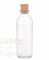 A 8oz vintage style  traditional  glass bottle with a cork.  The composite cork is tapered.