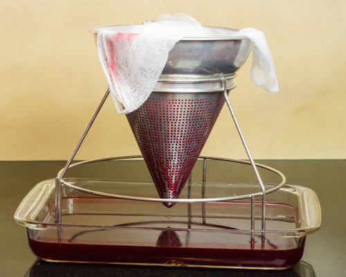 Cheese cloth - woven fabric used for straining fruit.  Leave to hang or squeeze yourself.  Preserving equipment.