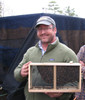 A happy customer with a beautiful 3# package of live honey bees.