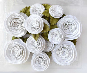 Spiral Paper Roses - Flower Craft Embellishments - White (12 Pack) (HM010)
These sophisticated multi layered Handcrafted Paper Flowers have been created with care and attention to detail. Use your creativity and imagination for that perfect floral touch. Ideal for all crafting projects including, handmade cards, scrapbooking, gift crafts and much more.  12pcs per pack.  Approx Sizes: Largest 30mm, Smallest 20mm.   Add adhesive to apply.  Variety of craft uses.