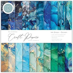Craft Consortium - Craft Papers - Ink Drops Ocean - 6x6 Paper Pad (CCEPAD018B)
Craft Consortium 6"x6" premium crafting card-stocks, 'The Essential Craft Papers' Collection Ink Drops Ocean.  The pad designs include coral and ocean inspired designs in shades of blue and green with gold detailing running through. These stunning sheets are perfect for creating stunning backgrounds for your cards and craft makes. Customize your journal pages, scrapbook layouts, planner pages and more. Add beautiful detailing to all of your craft designs.  Each 6"x6" gummed pad offers 20 designs across 40 double sided sheets, on 180gsm acid & lignin free cardstock, offering that same premium quality which Craft Consortium is renowned for. Craft Consortium - Craft Papers - Ink Drops Ocean - 6x6 Paper Pad (CCEPAD018B)
Craft Consortium 6"x6" premium crafting card-stocks, 'The Essential Craft Papers' Collection Ink Drops Ocean.  The pad designs include coral and ocean inspired designs in shades of blue and green with gold detailing running through. These stunning sheets are perfect for creating stunning backgrounds for your cards and craft makes. Customize your journal pages, scrapbook layouts, planner pages and more. Add beautiful detailing to all of your craft designs.  Each 6"x6" gummed pad offers 20 designs across 40 double sided sheets, on 180gsm acid & lignin free cardstock, offering that same premium quality which Craft Consortium is renowned for.
