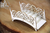 Scrapiniec - Chipboard Embellishments - Winter at the Gates - 3D Bridge (5272)
Scrapiniec Decorative Chipboard Embellishments. 3D Park Bridge, from the Winter at the Gates collection.  Easy to build, with cut out slots. Recomend using a small amout of glue to secure.  Perfect for use in cardmaking, exploding boxes, scrapbooking, albums and other creative crafts.  To decorate them you can use inks, paints, sprays, glitters, embossing powders and colourful papers.  Approximate size of the bench after folding is each embellishment 85 x 38mm.  Made of chipboard 1.2 mm thick.  All embellishments are embedded into the sheet, so to remove them, you simply push them out of the sheet, any stubborn pieces may need to be cut out with a craft knife following the designated lines. Scrapiniec - Chipboard Embellishments - Winter at the Gates - 3D Bridge (5272)
Scrapiniec Decorative Chipboard Embellishments. 3D Park Bridge, from the Winter at the Gates collection.  Easy to build, with cut out slots. Recomend using a small amout of glue to secure.  Perfect for use in cardmaking, exploding boxes, scrapbooking, albums and other creative crafts.  To decorate them you can use inks, paints, sprays, glitters, embossing powders and colourful papers.  Approximate size of the bench after folding is each embellishment 85 x 38mm.  Made of chipboard 1.2 mm thick.  All embellishments are embedded into the sheet, so to remove them, you simply push them out of the sheet, any stubborn pieces may need to be cut out with a craft knife following the designated lines.