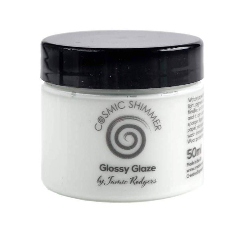Cosmic Shimmer - Jamie Rogers - Glossy Glaze - Honeydew - 50ml (CSGGHONEY)

The gel is a water based dimensional translucent glaze, perfect for creating amazing effects a huge variety of projects.  The light pigment adds a hint of colour to the glaze.  When dry the glaze will hold its shape, but still remains flexible.  The unique gel formulation makes the application fool-proof, and it can easily be applied to any porous or non-porous surface using a spatula, brush or sponge.  Because the glaze is flexible it can be die-cut after drying, try applying to acetate and allowing to dry and then die-cutting an image.  Use through stencils or directly to card, paper, rice paper, MDF, acetate and many other substrates.  Apply by smoothing over projects in one direction.  Easy soap and water clean up after use.  Light Glossy Glaze colours are not lightfast, therefore it is recommended that your work is stored away from direct sunlight. 50ml.  Made in the United Kingdom.