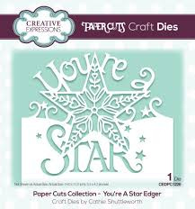 Creative Expressions Paper Cuts You're A Star Edger Craft Die

Designed by Cathie Shuttleworth, this single die creates the look of hand cut paper creating great images. This single edger die has an image of an ornate star and text 'You're a Star' that will make a perfect card front. The die is perfect for scrap booking beautiful memories and for card making. The die will work beautifully with the other dies in the collection. This is a very versatile high-quality steel die. The die is compatible with most home die cutting machines. Die size 14.0 x 11.0 cm, 5.5 x 4.3 inches.

• Gives the illusion of the intricate skill of Paper Cutting by simply die cutting
• Great die for a card front
• Die size 14.0 x 11.0 cm, 5.5 x 4.3 inches