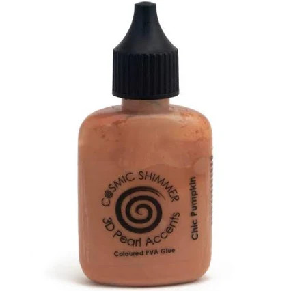 Cosmic Shimmer - 3D Pearl Accents - Coloured PVA Glue - Chic Pumpkin 30ml (CSPMGPUMP)

Use Cosmic Shimmer 3D Accents in Chic Pumpkin to add stunning dimension and a beautiful pearlescent finish to all your crafts projects.  This high-quality, pearlescent PVA glue is perfect for attaching embellishments.

Ideal for card making, scrapbooking, journals, papercraft, and mixed media, 3D Accents allow you to create custom decorative details that dry to a smooth, glossy, pearlescent finish.  This versatile glue is a creative essential.

It is easy to apply with its fine nozzle and even easier to clean up—just use soap and water while wet.  Available in a variety of pearlescent colours.