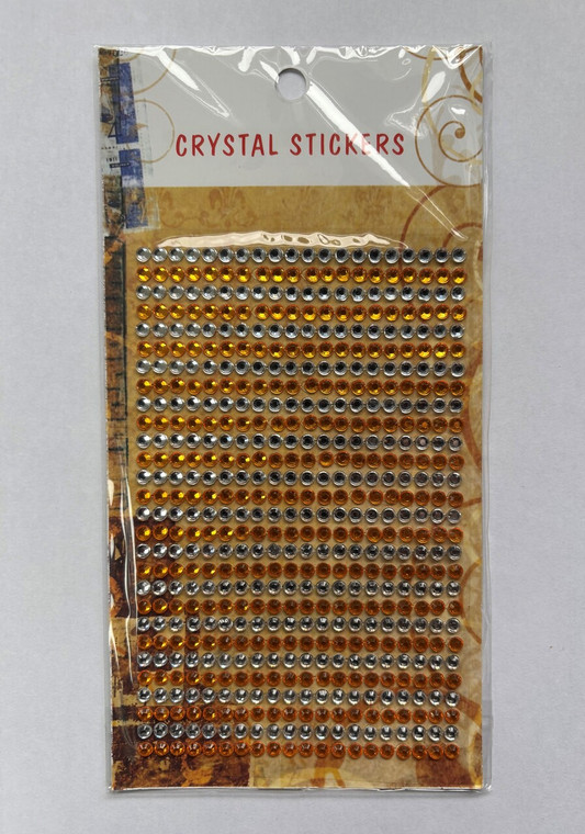 Crystal Adhesive Gems - 4mm - 560pcs per card - Gold & Silver (CAD4560G+S)

Pack of 4mm Gold & Silver Adhesive Gems, 560pcs per card.  Embellishment Sheet ideal for adding a little sparkle to all of your Craft Projects.  Multiple uses, some additional uses are suggested on the back of the pack.  Keep out of the reach of children, as gems are small and could easily be ingested.