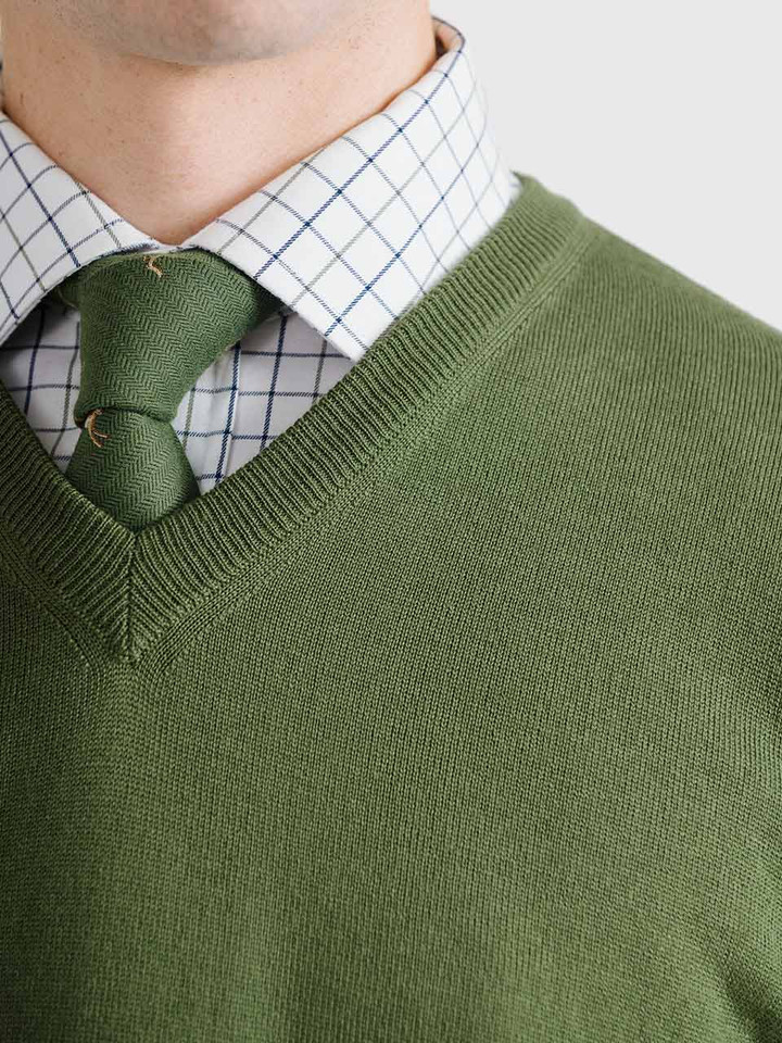 Men's Leaf Green Merino Wool V-Neck Jumper On Model