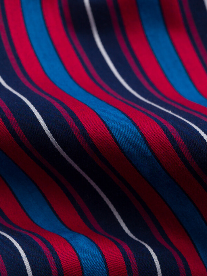 Close Up of Navy & Red Club Striped cotton Pyjamas fabric