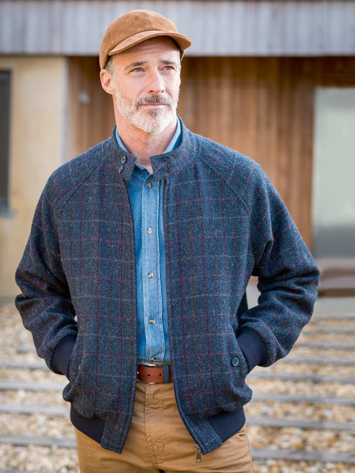 Model wears Navy Harris Tweed® Harrington Jacket