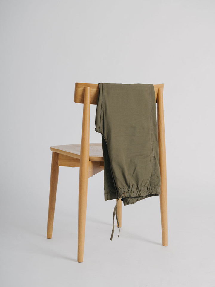 Men's Green Olive Drawstring Khaki Waist Trousers on Chair