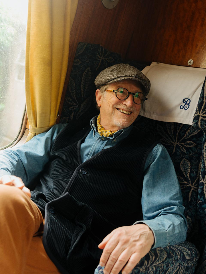 Lord Trousers sitting on train