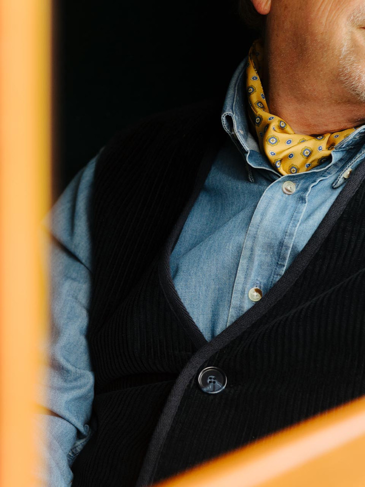 Lord Trousers wears Washed Denim Shirt, Gold Paisley Silk Cravat & Corduroy Gilet