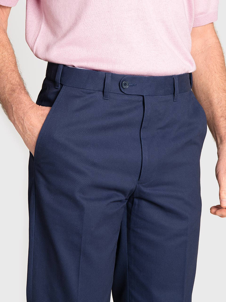 Men's Navy Blue Slim Fit Chino Trousers On Model Closeup Front