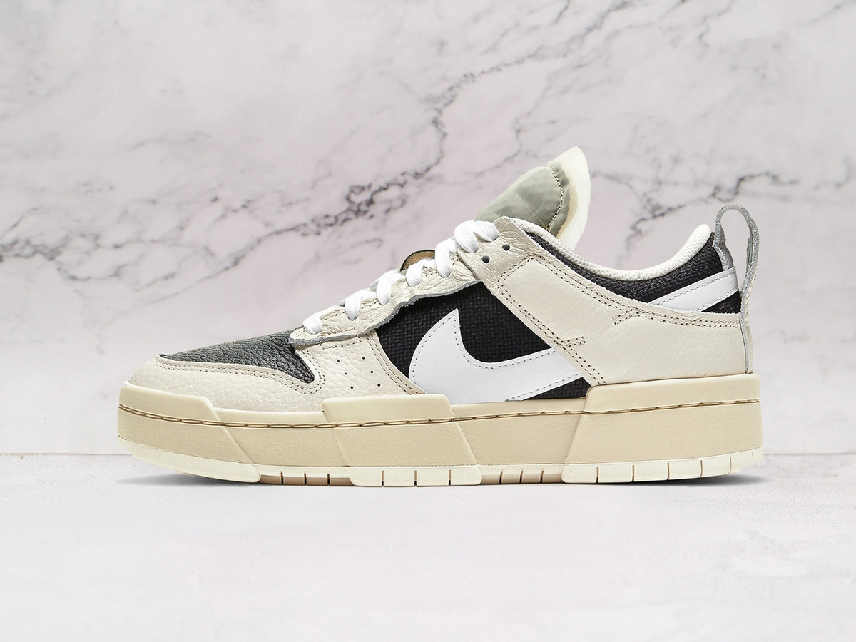 Nike SB Dunk Low ‘Pale Ivory Black’ – Suede and leather sneaker with black rubber outsole