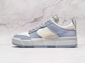 Nike SB Dunk Low Disrupt ‘Summit White Ghost’ – Leather and suede sneaker in Summit White and Desert Sand