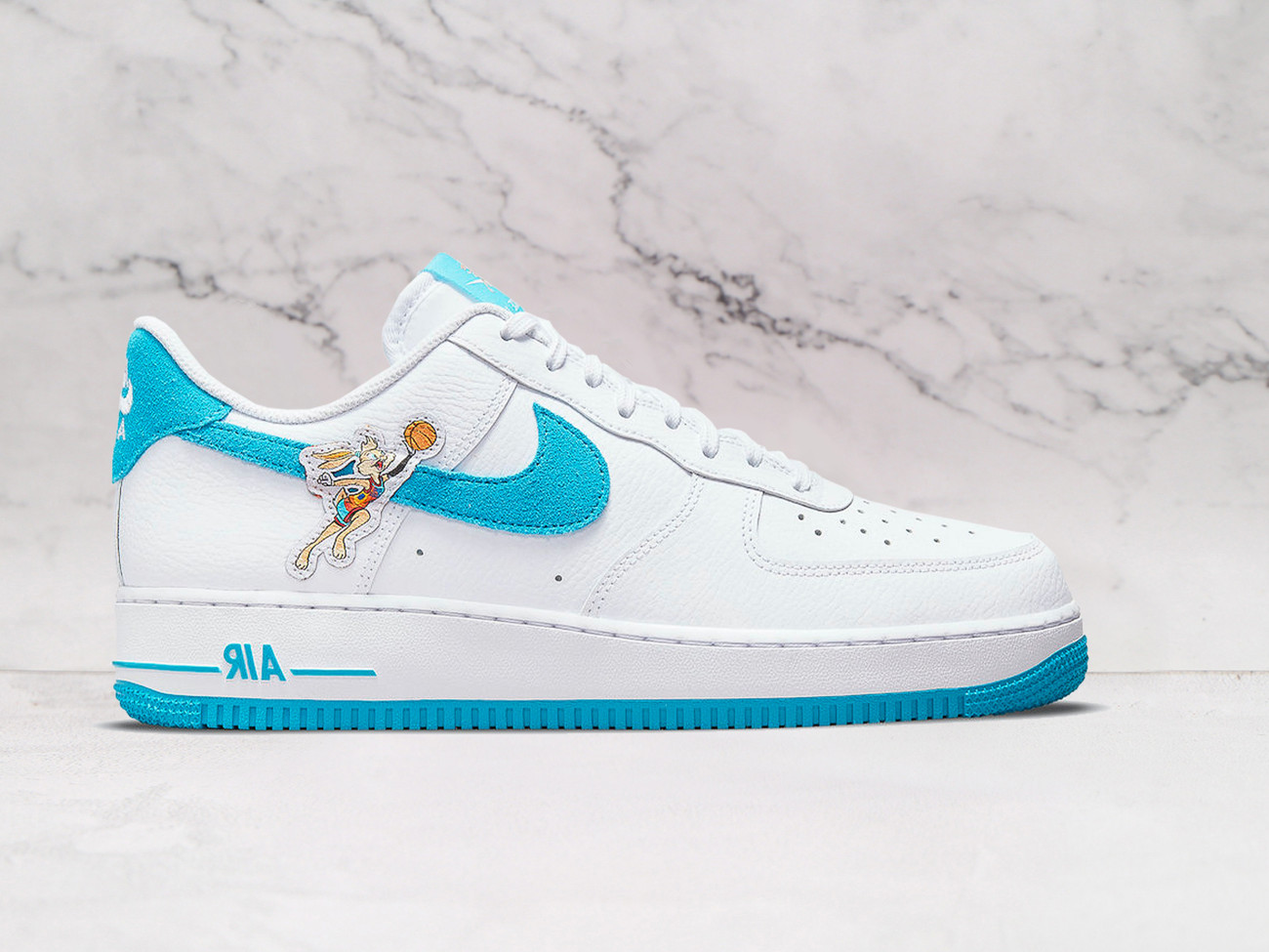 Nike Air Force 1 Low 'Hare' – White Leather Upper with Light Blue Fury Accents and Bugs and Lola Bunny Embroidered Graphics