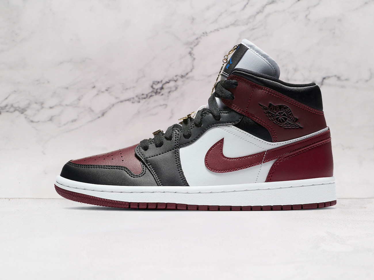 Air Jordan 1 Mid SE 'Black Dark Beetroot' – Black and Dark Beetroot Upper with Gold Lace Pendants