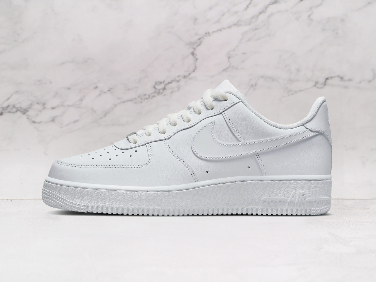 Nike Air Force 1 Low Triple White ‘07 with tonal white Swoosh and leather