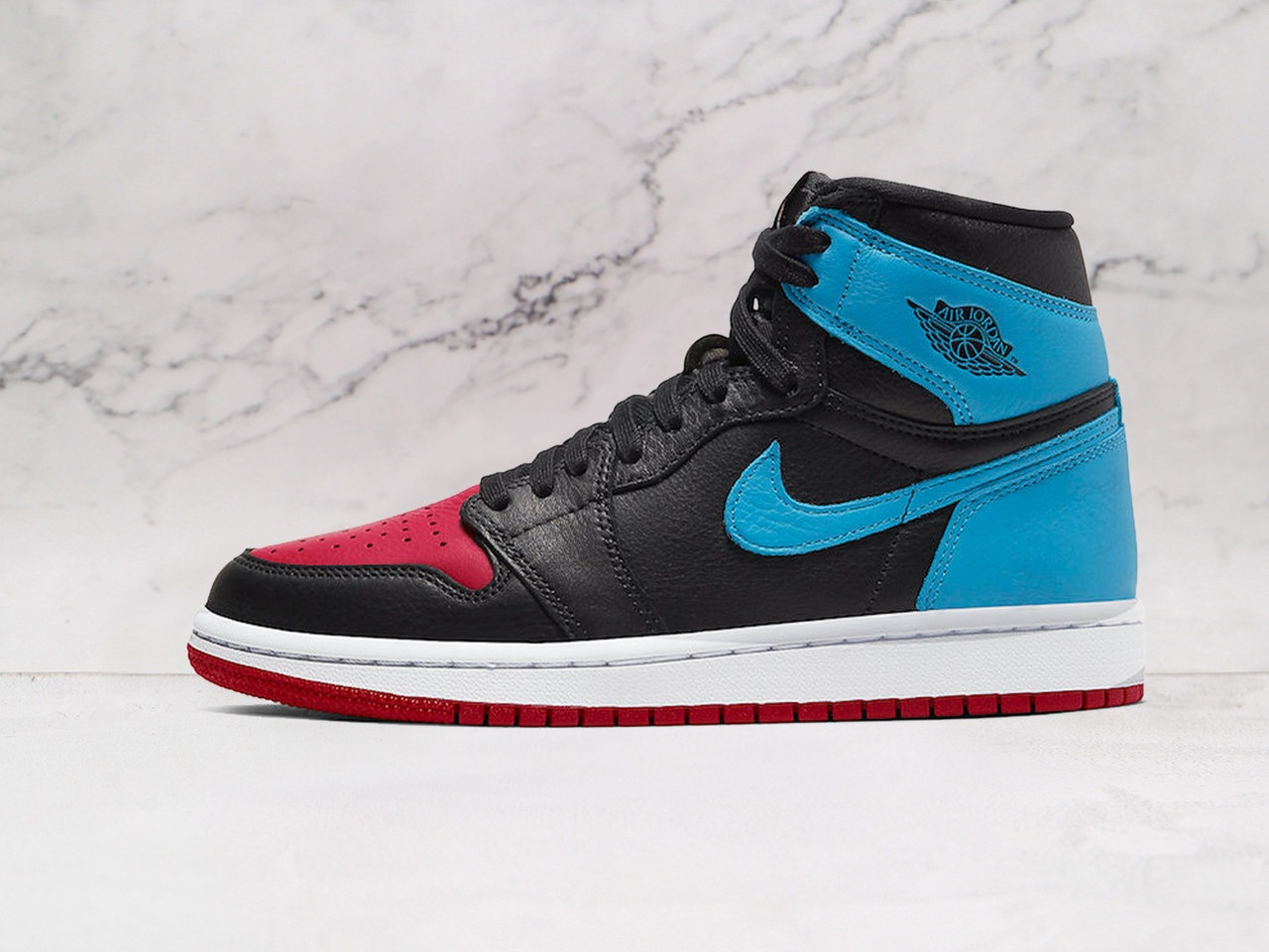 Air Jordan 1 Retro High ‘NC to CHI’ – Premium Leather with UNC Blue & Chicago Red Accents