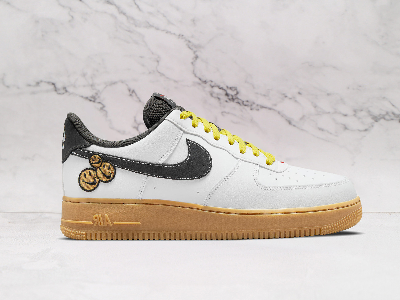 Nike Air Force 1 LV8 'Go The Extra Smile' – White Leather Upper with Black Cracked Leather Swoosh, Yellow Laces, and Smiley Face Graphics on Heel