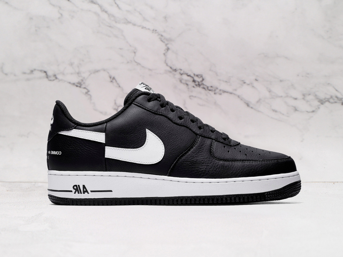 Nike Air Force 1 Low Supreme x Comme des Garçons (2018) – Black Leather Upper with Split Swoosh Design