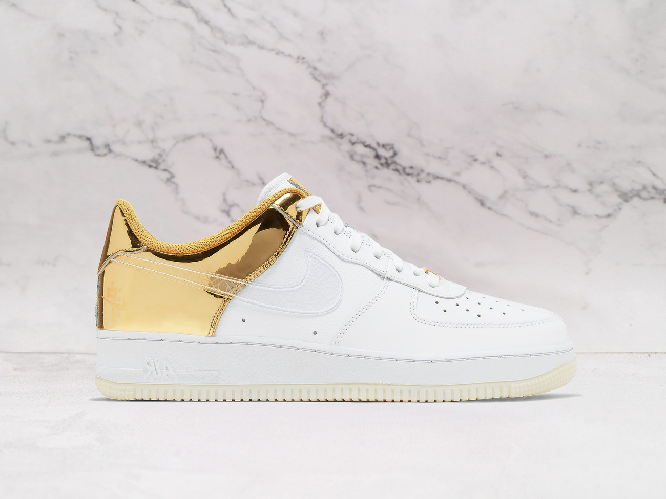 Nike Air Force 1 'Golden Era' – White Leather Upper with Metallic Gold Heel and Transparent Swoosh