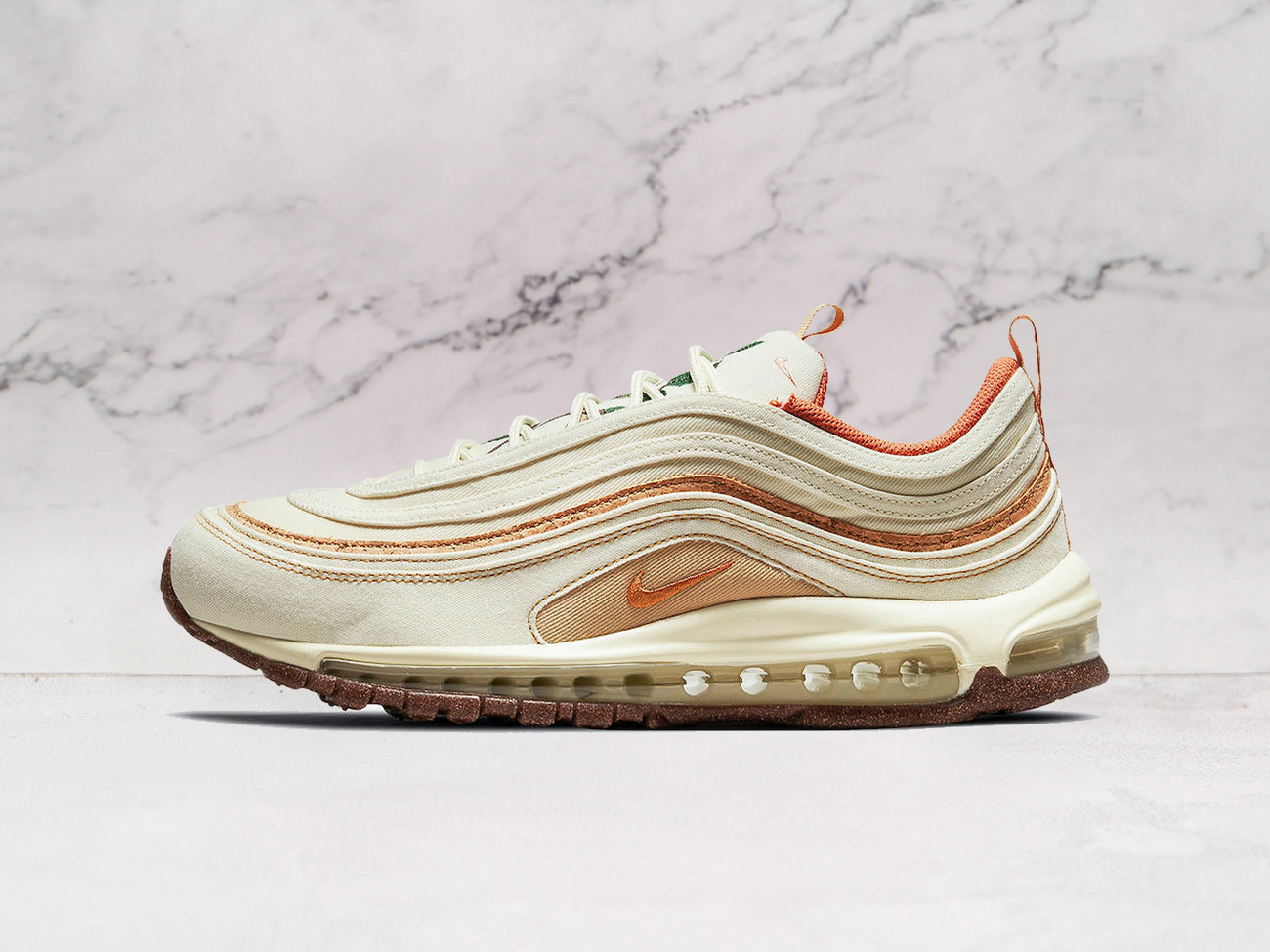 Air Max 97 Coconut Milk Cork side profile featuring a soft off-white upper, sustainable cork overlays, and nature-inspired textures for an organic aesthetic