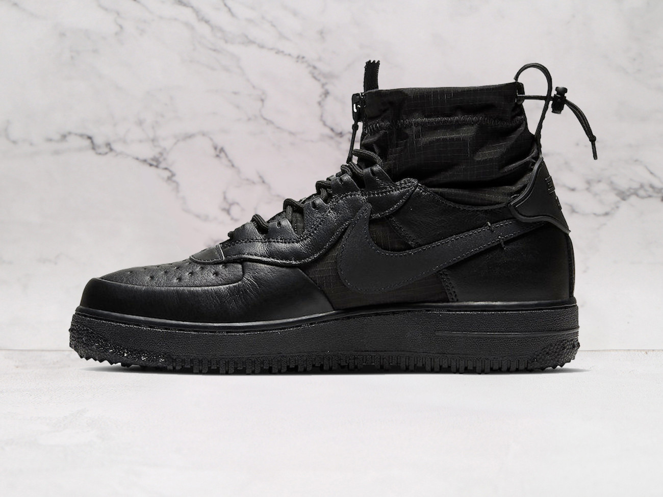 Triple Black Nike Air Force 1 High medial view with Gore-Tex upper and sole