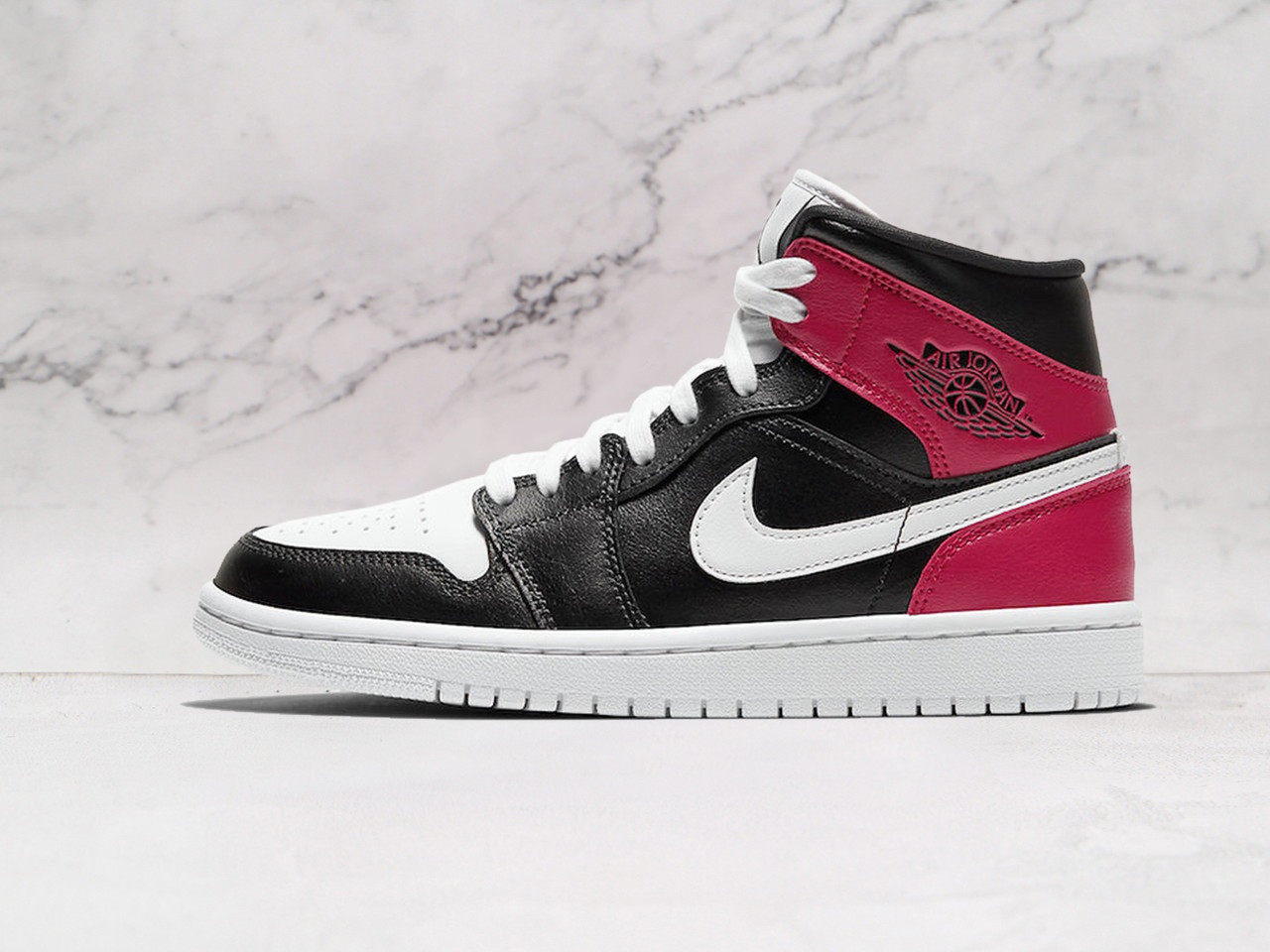 Air Jordan 1 Mid Black Noble Red – Premium Black Leather Upper with Noble Red Accents