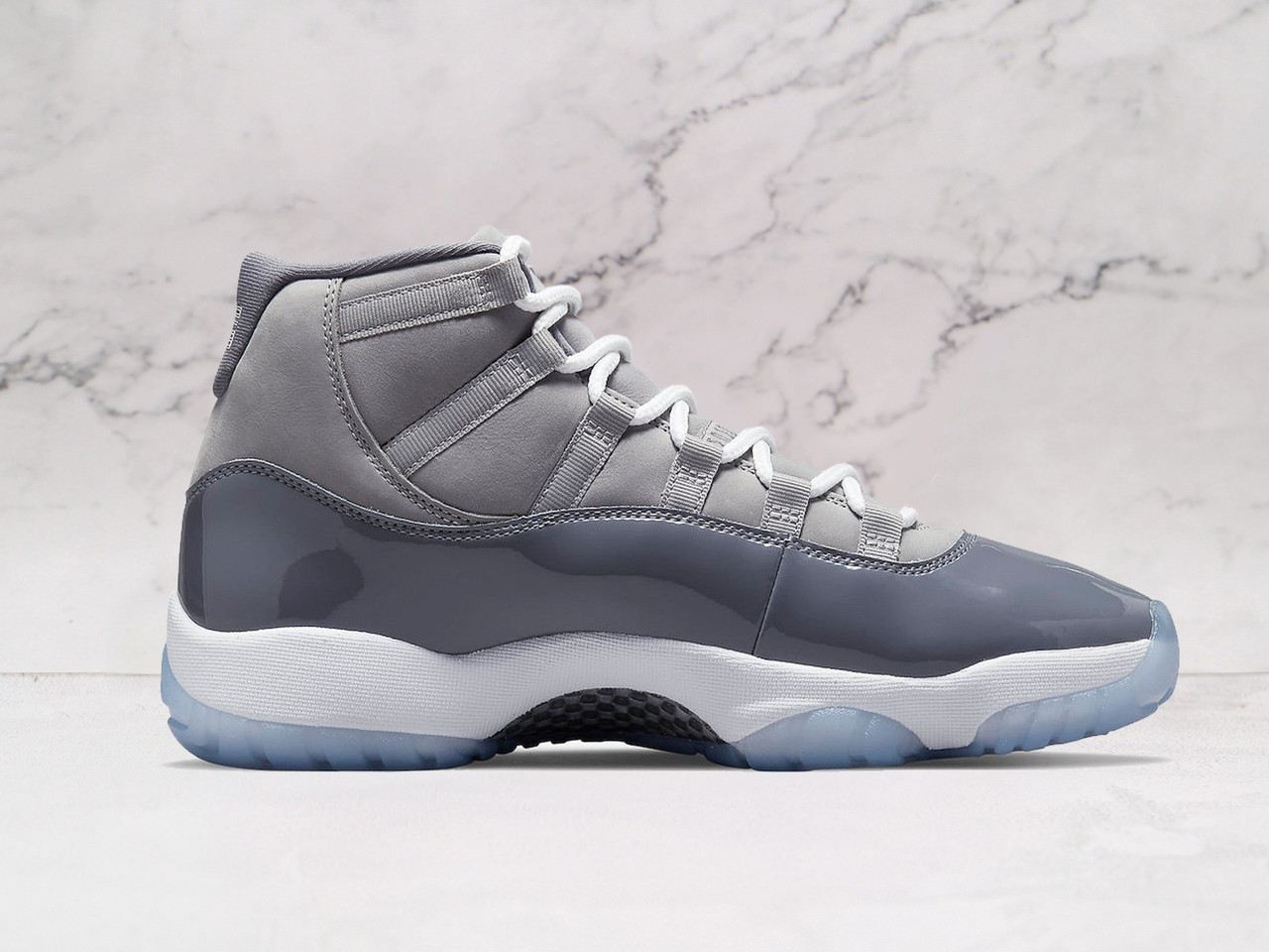 Air Jordan 11 Retro Cool Grey medial view, grey upper with Jumpman embroidery