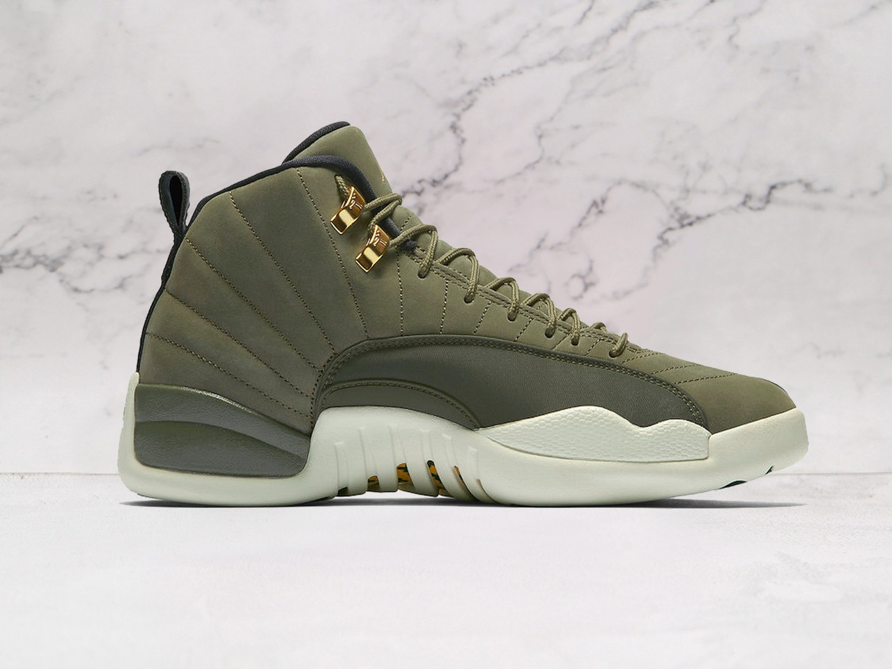 Medial view of Air Jordan 12 Retro Chris Paul Class of 2003 in olive suede